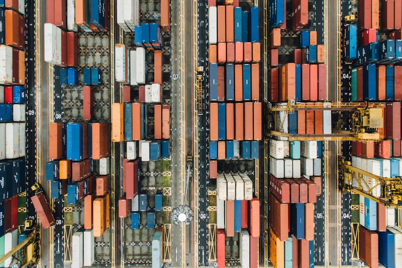 Aerial photograph of rows of shipping containers at a port